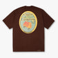 Camiseta oversized marrom da marca Sopro Company com estampa de cajuína na parte de trás.