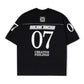 Camiseta preta Rolimã Racing com estampa colorida de arco-íris e logo da marca SOPRO.